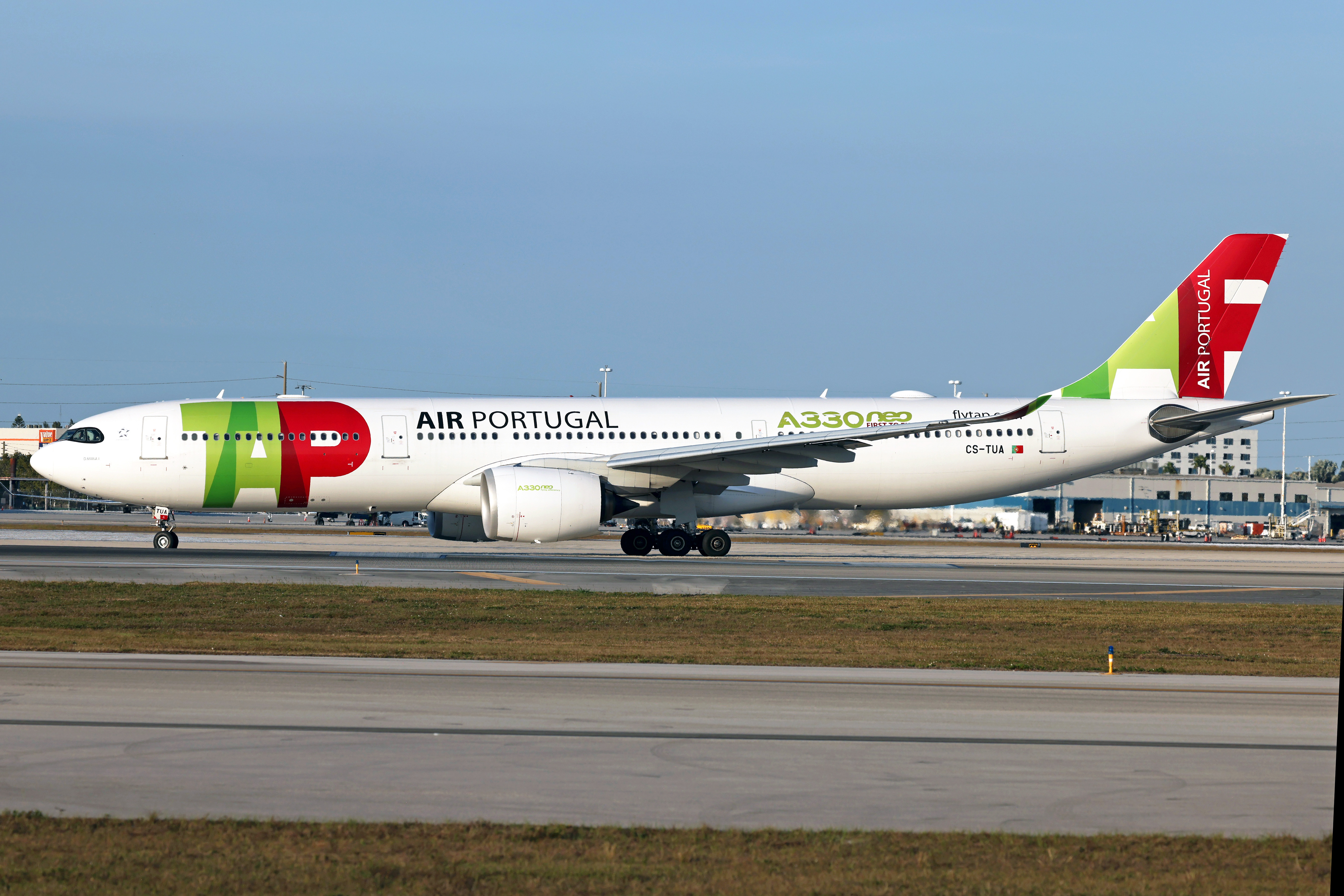 TAP Air Portugal Airbus A330-900neo CS-TUA at Miami Airport, with the TAP logo and Air Portugal name visible on the fuselage.
