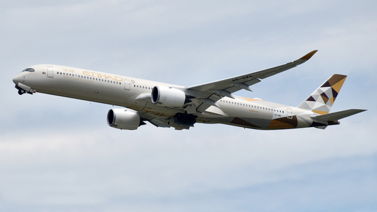Etihad Airways Airbus A350-1000 A6-XWA in flight, archive photograph from 2024